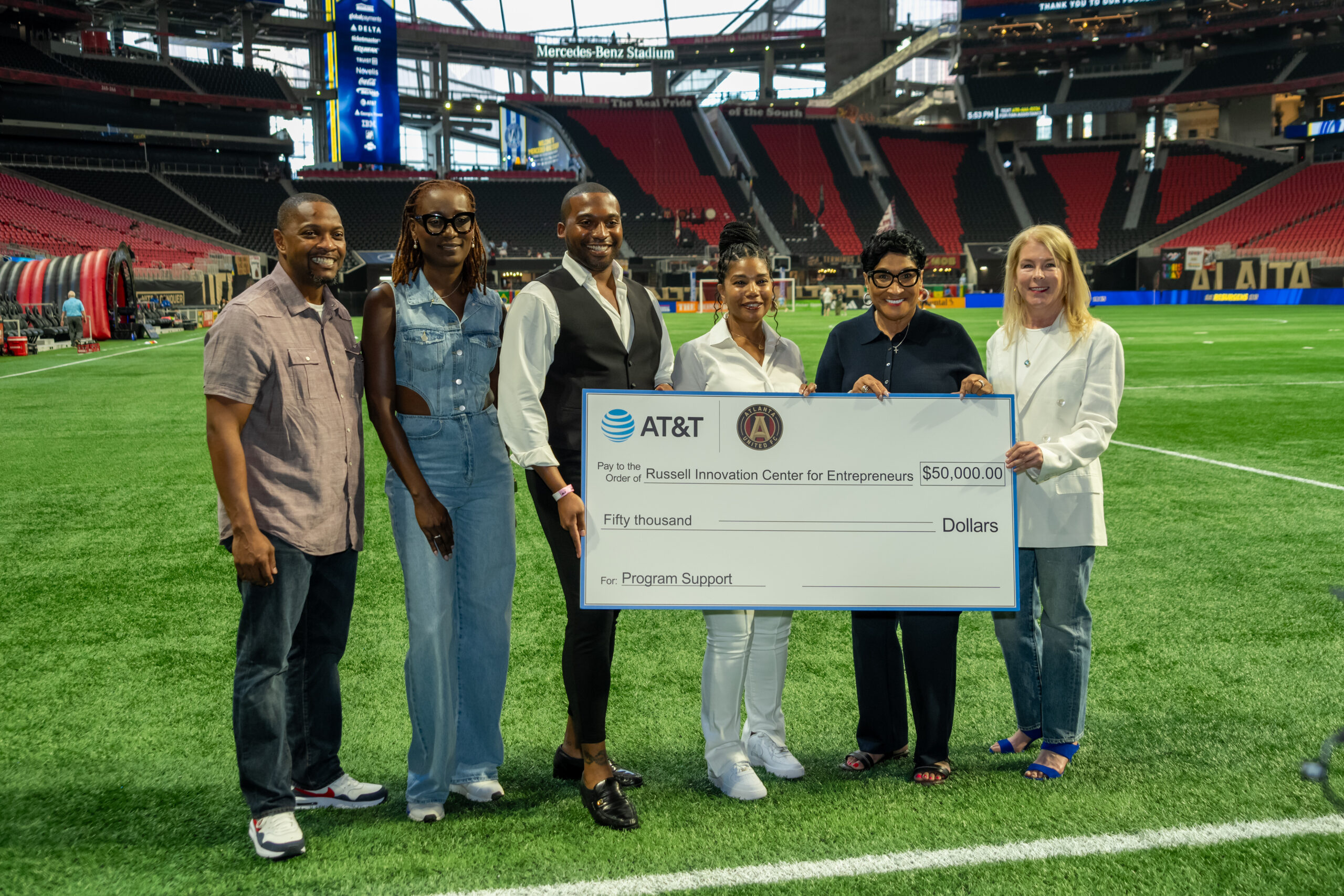 Vanessa Harrison, President of AT&T Southeast Coastal States, presented the check to our very own Shawn Graham, Executive Vice President and Chief Administrative Officer, and Dr. Quintin Bostic, Associate Director of Programming and Project Management.